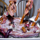 Image for article titled 10 Meat Structures That Require Engineering Degrees to Build and a Death Wish to Eat